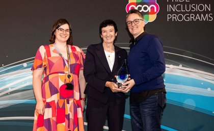 Flic French (left) and Dr Dino Willox (right) receiving the Pride in Diversity ‘Gold Employer’ award on behalf of UQ from Jennifer Westacott AO, CEO of Business Council of Australia (centre). Credit: Mark Bond Photography Flic French, Jennifer Westacott and Dr Dino Wilcox standing together and smiling